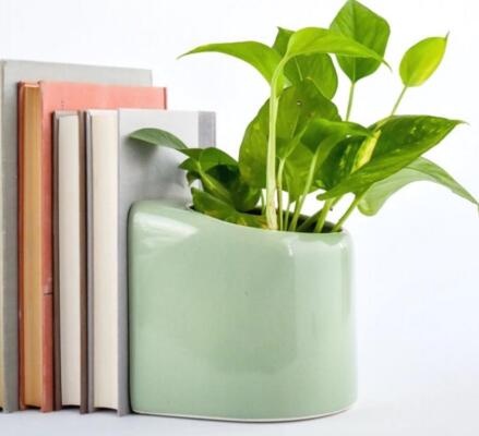 ceramic bookend with pen holderand plant pot