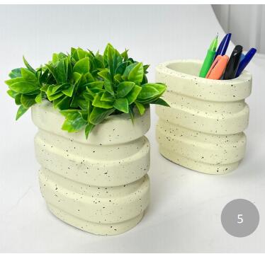 ceramic bookend with pen holder and plant pot